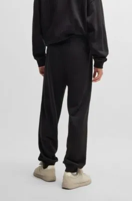 Cotton-terry tracksuit bottoms with chain-stitch logo