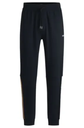 Cotton-terry tracksuit bottoms with tape inserts