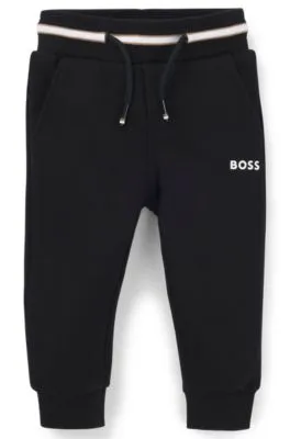 Kids' tracksuit bottoms with logo print