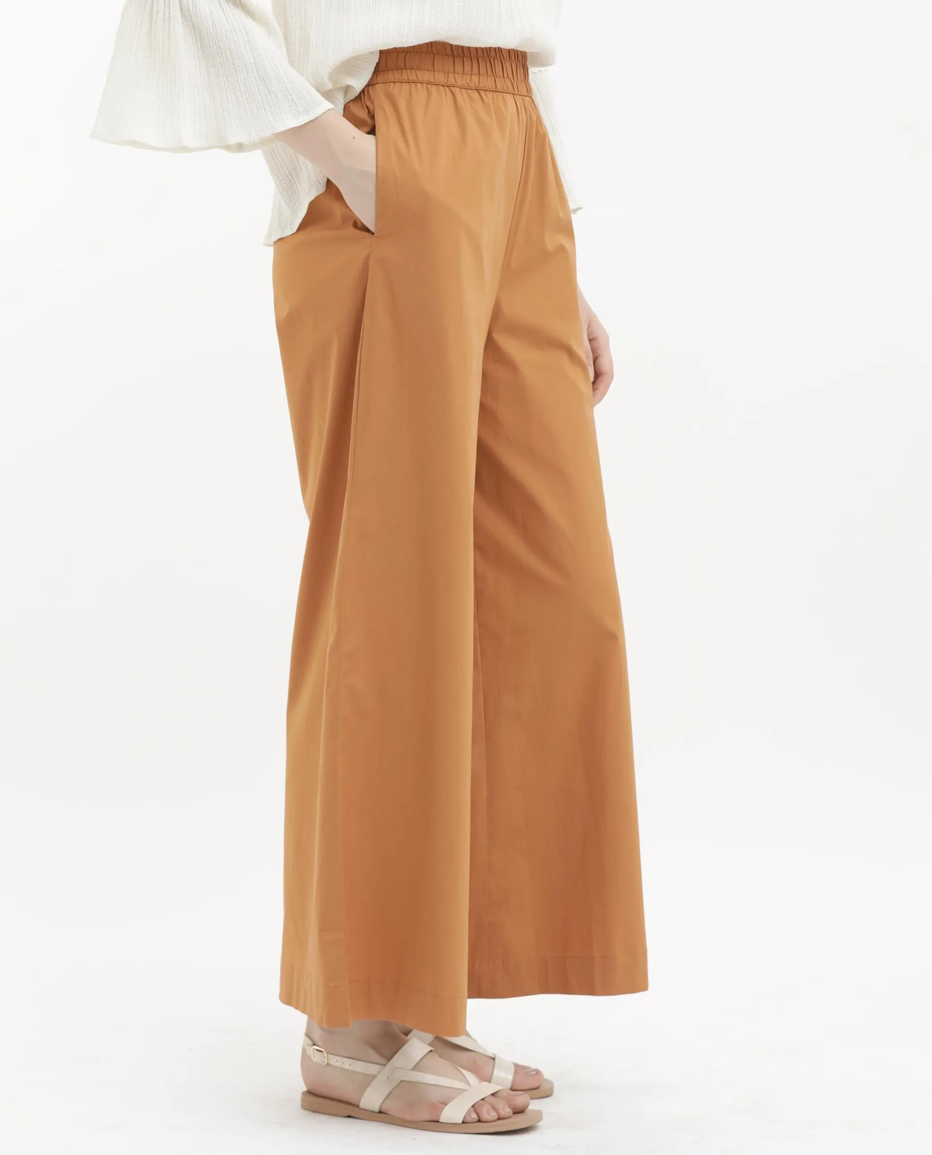 Rareism Women Kofu Light Brown Cotton Fabric Tie-Up Closure Flared Fit Plain Ankle Length Trousers