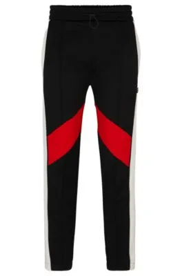 Relaxed-fit tracksuit bottoms with color-blocking